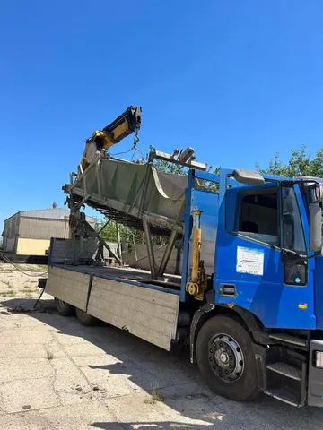 Preprava oceľovej konštrukcie hydraulickou rukou